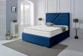 Blue bed frame with white mattress in a modern bedroom setting