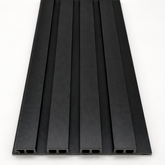 Black WPC outdoor wall cladding panels installed on modern garden wall