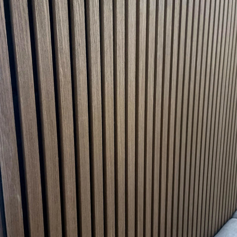 Dark oak slatted wall panel for modern interiors