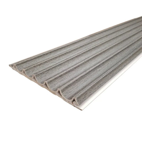 ModernAsh grey WPC wave wall panel cladding with textured wave pattern for living room feature walls.