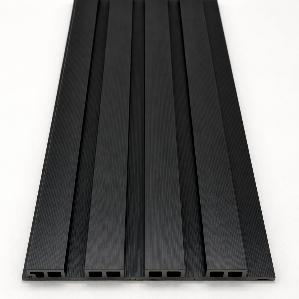 Black WPC outdoor wall cladding panels installed on modern garden wall

