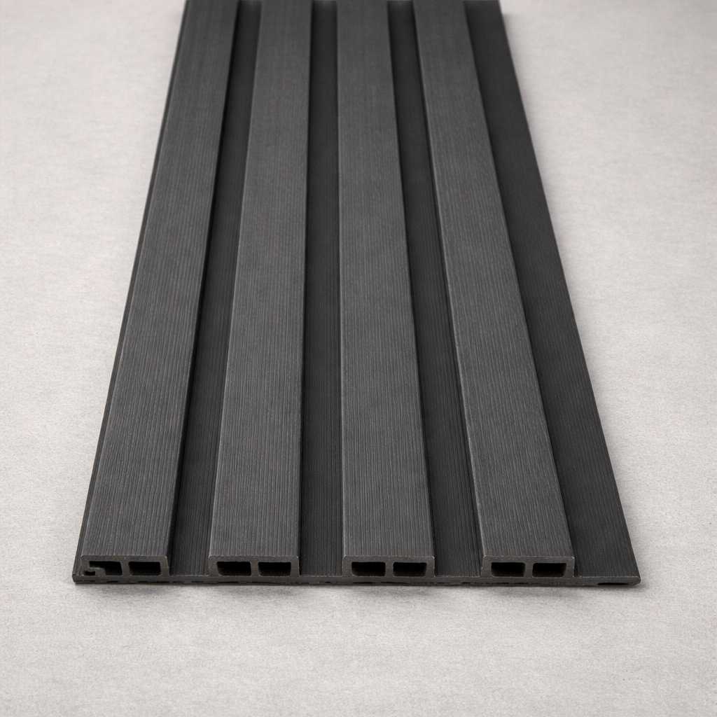 Grey composite slat wall panel used for modern outdoor fence and wall cladding.

