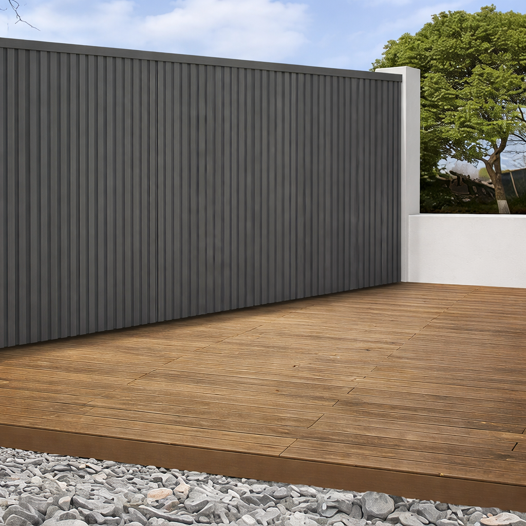 Textured charcoal grey composite wall panel for exterior fencing and cladding.

