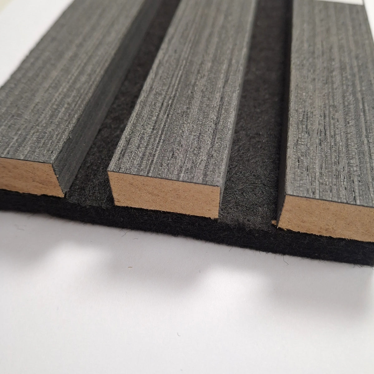 Black oak acoustic slatted wall panels 240x32cm UK interior

