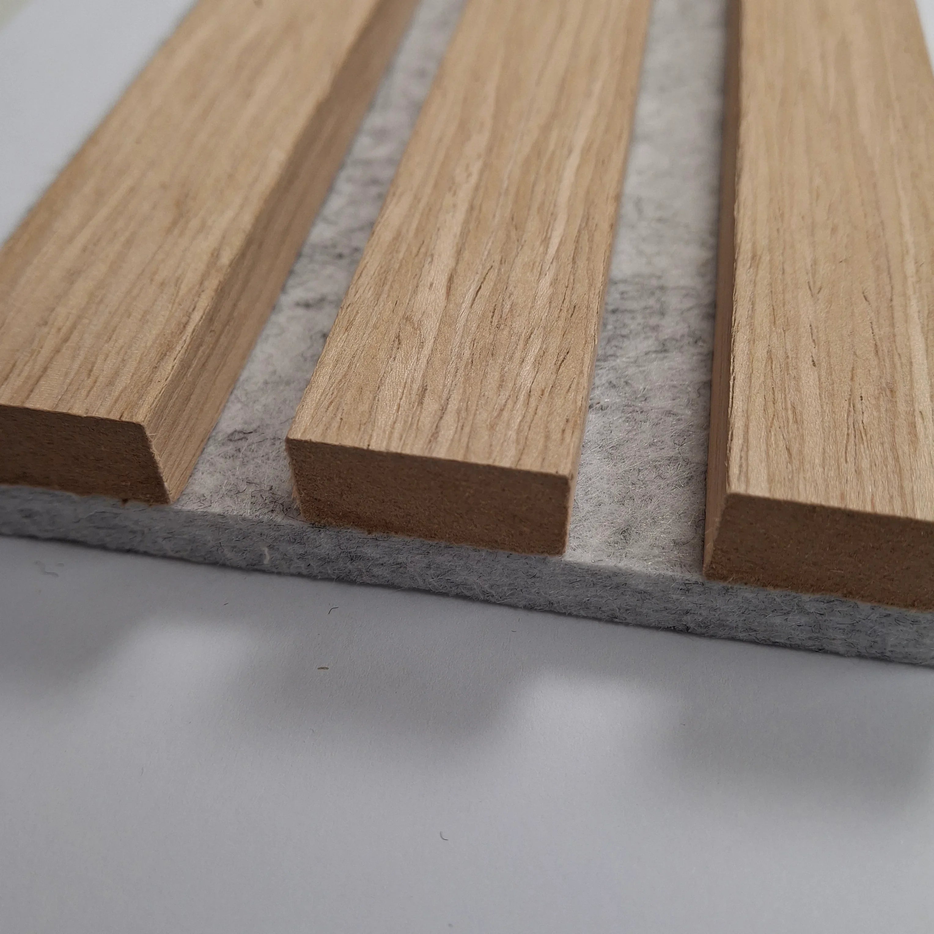Oak on grey felt acoustic slatted wall panel 240x32cm UK interior

