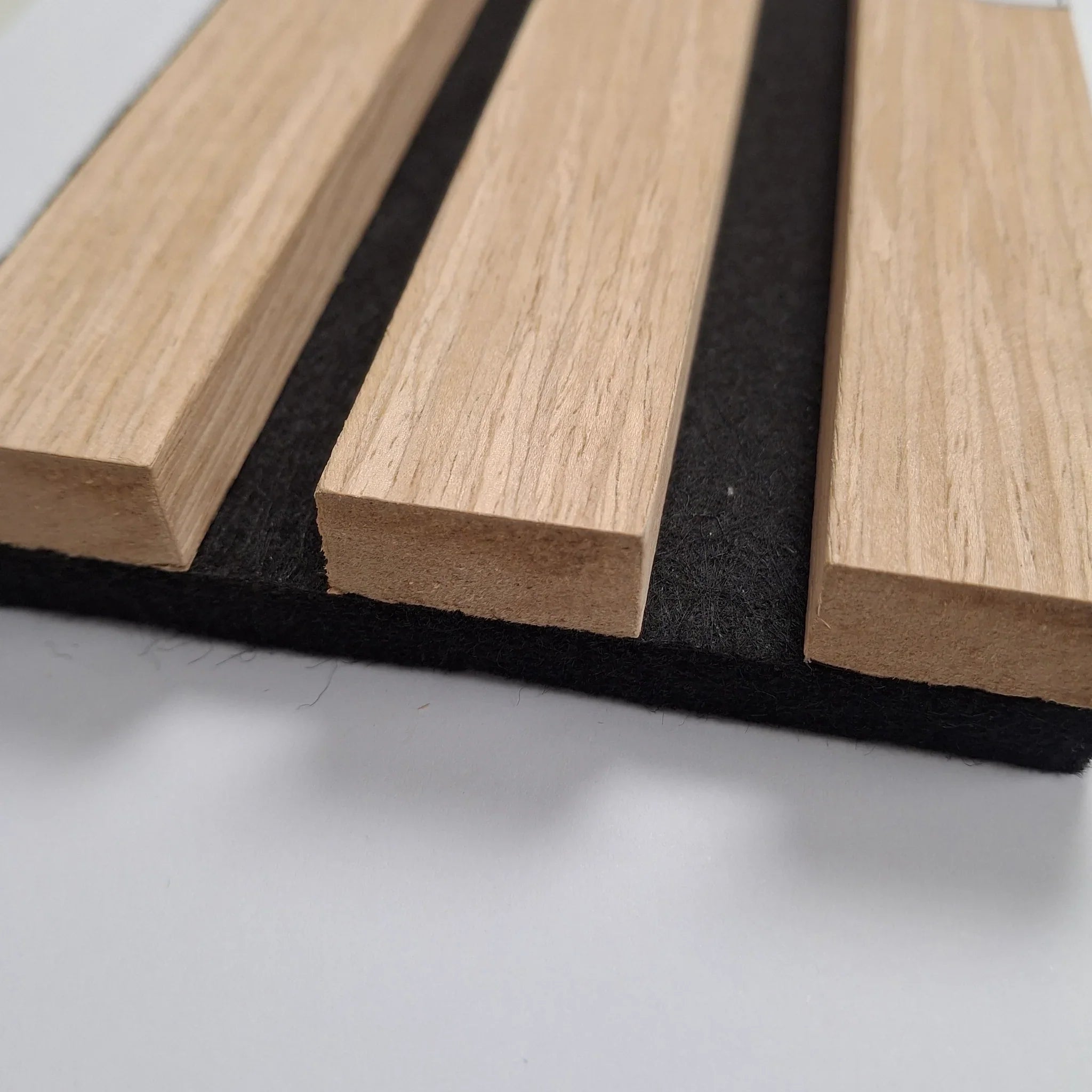 Oak acoustic slatted wall panels 240x32cm UK interior

