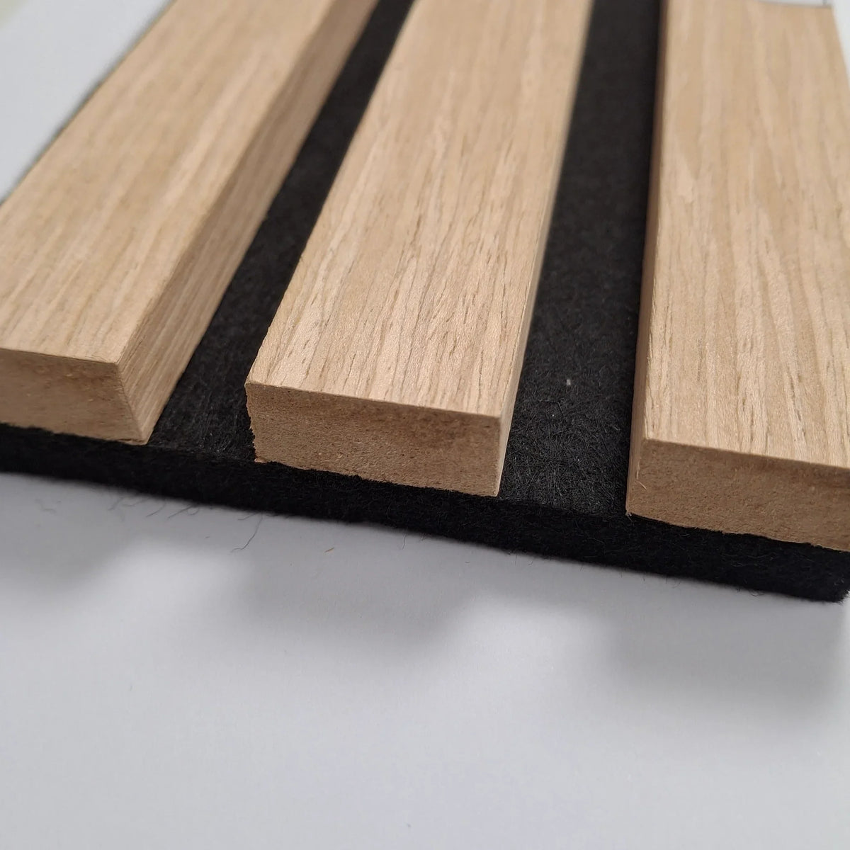 Oak acoustic slatted wall panels 240x32cm UK interior

